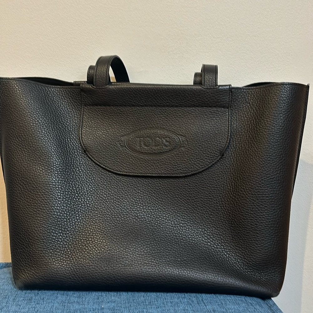 Tod’s genuine leather black tote bag.